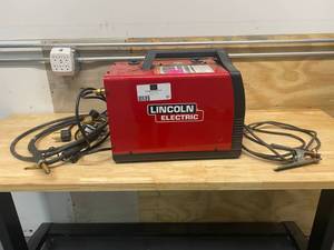 lot 97 image: LINCOLN ELECTRIC 180 Amp Weld-Pak 180 HD MIG Wire Feed Welder with Magnum 100L Gun, Gas Regulator, MIG and Flux-Cored Wire, 230V