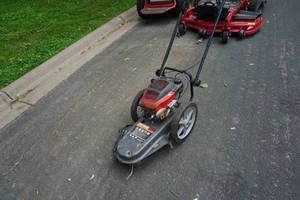 lot 25 image: Craftsman Model 5HP22 Commercial Walk Behind Weed Trimmer