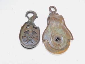 lot 84 image: 2 Vintage Cast Iron Pulley Wheels