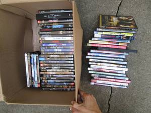 lot 81 image: Box of DVDs See Photos...