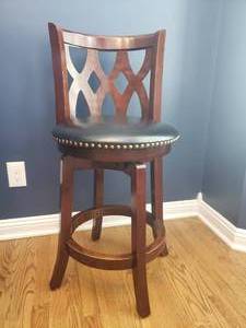 lot 32 image: Mahogany Swivel Black Swivel Bar Stools, set of 3