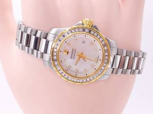 lot 12 image: Ladies Movado 800 Series Diamond and Mother-of-Pearl Watch $2499