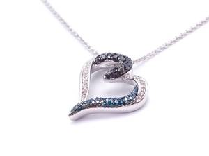 lot 36 image: Natural Black, Blue, and White Diamond Heart Shaped Estate Necklace