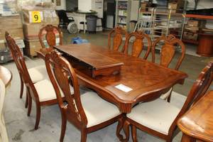 Wood Pedestal Dining Table with 8-Padded Wood Dining Chairs and Leaf