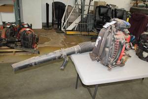 lot 40 image: Husqvarna RedMax Hip-Mounted Throttle Backpack Leaf Blower 206  mph 908 cfm 76 cc Gas 2-Stroke EBZ8500