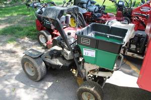 lot 12 image: Lesco Stand-On Fertilizer 189cc with 125lb. Capacity Bin