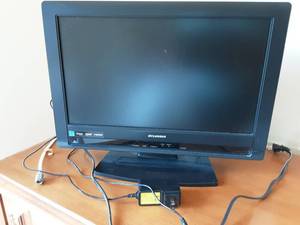 lot 65 image: Sylvania Flat Screen TV With Remote