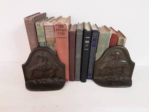 lot 121 image: Cast Iron Cowboy Book Ends & Books