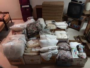 lot 204 image: Large Lot (12 Boxes) Bedding, Pillows, Quilts, Flip Fold Mattress