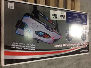 lot 45 image: Triumph Fire n Ice LED Light-Up 54 Air Hockey Table Includes 2 LED Hockey Pushers and LED Puck SEE PICS