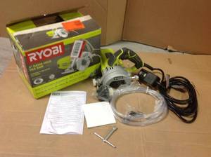 lot 48 image: RYOBI 4 in. Tile Saw SEE PICS