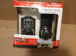 lot 79 image: Honeywell Oil Rubbed Bronze Keypad Electronic Knob Entry Door Lock in good condition