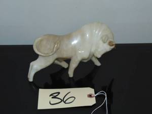 lot 36 image: Vintage stone carved bull