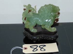 lot 88 image: Vintage Jade foo dog with ornate stand