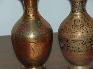 lot 384 image: Pair of brass vases made in India