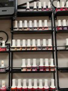 lot 107 image: Lot of 34 Gel Nail Polish & Rack (plus extra rack)
