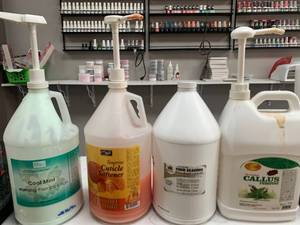 lot 168 image: Partial Bottles of Nail Supplies