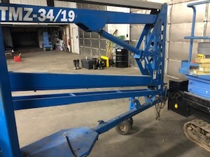 lot 3 image: Genie TMZ 3419 Towable Articulating Boom Lift
