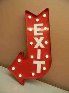 lot 23 image: RED METAL LED LIGHTED ARROW EXIT SIGN - BATTERY OPERATED - NICE - WORKS - APPROX 14 BY 23 - SEE PICTURES