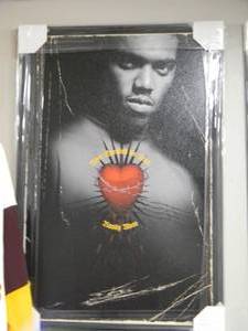 lot 32 image: Randy Moss NIKE HEART 5575 HOF POSTER - RARE - FULL SIZE POSTER STILL IN PACKAGE - AWESOME RARE PIECE READY FOR FRAMING - SEE PICTURES