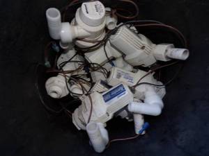 lot 97 image: Boat Parts Pail of Pumps