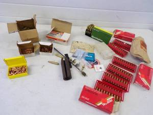 lot 155 image: Reloading supplies including primers, bullets, and Casings