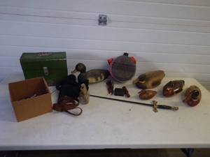 lot 203 image: Hand Carved Duck Decoys, Sward, Gun Cleaning items and more