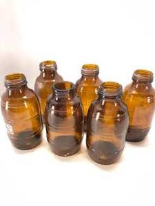 lot 45 image: Collectible 6 pack of (Schmidt) Bottles, 6 Tall Brown Glass
