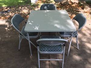 lot 178 image: Meco Folding Table With Four Chairs