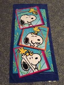 lot 195 image: Three Peanuts Beach Towels and Inflatable Beach Toy