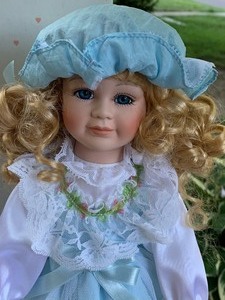 lot 299 image: Adorable Collector Doll