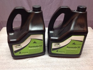 lot 106 image: Artic Cat Formula 50 2 Cycle Oil