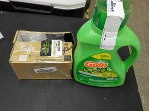 lot 279 image: Gain 2.2L Laundry Detergent and 2 G...