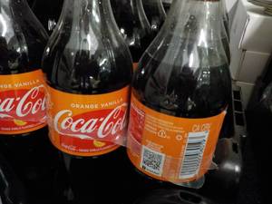 lot 284 image: case of 24 Coca Cola Orange Vanilla...