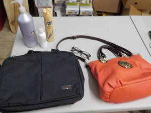 lot 339 image: Michael Kors Purse handles are wor...