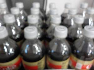 lot 357 image: Case of 24 Bottles Caffeine Free Di...