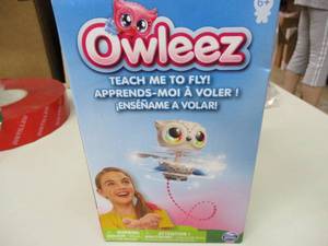 lot 14 image: Opened Na Na Surprise Doll and Ow...