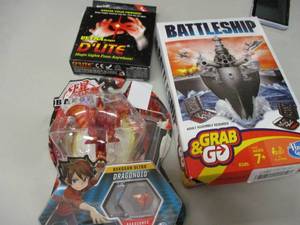 lot 23 image: Grab and Go Battle Ship Game and Ul...