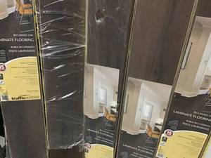 lot 47 image: LOT WITH 9 CASES OF TRAFFIC MASTER Reclaimed Oak 7 mm Thick x 7-23 in. Wide x 50-58 in. Length Laminate Flooring (24.17 sq. ft.  case) SEE PICS