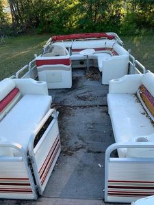 1999 Smokercraft 24 Pontoon Boat & 24 Trailer. Has A 50 Hp. Johnson Motor.