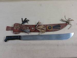 lot 104 image: Montero Machete with Leather Sheath