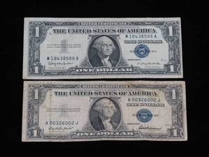 lot 75 image: 1935F and 1957B $1 Blue Seal Silver Certificates