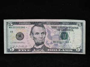 lot 60 image: 2013 $5 Bill - Star Note