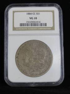 lot 6 image: 1884-CC Morgan Silver Dollar - NGC VG10
