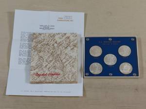 lot 1 image: Set of the First 5 S Mint Morgan Dollars