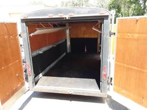 lot 1 image: 1998 12 X 6 Avenger Enclosed Trailer With Front Side Door & Rear Barn Doors.