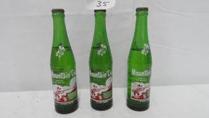 lot 35 image: Vintage Mountain Dew 3 Bottles ( Full )