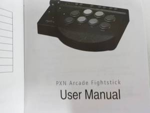 lot 49 image: PXN Arcade Fight stick and Manual...