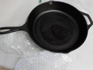 lot 142 image: Lodge Cast Iron Skillet...