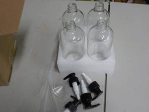 lot 219 image: Set of 4 Bottles with Pumps...